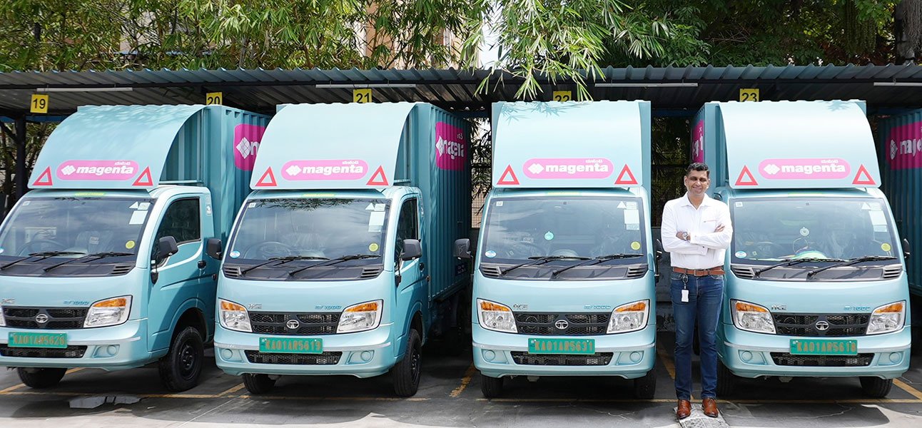 Mr.-Maxson-Lewis-Founder-CEO-Magenta-Mobility-with-the-fleet-of-Tata-Ace-EVs-low